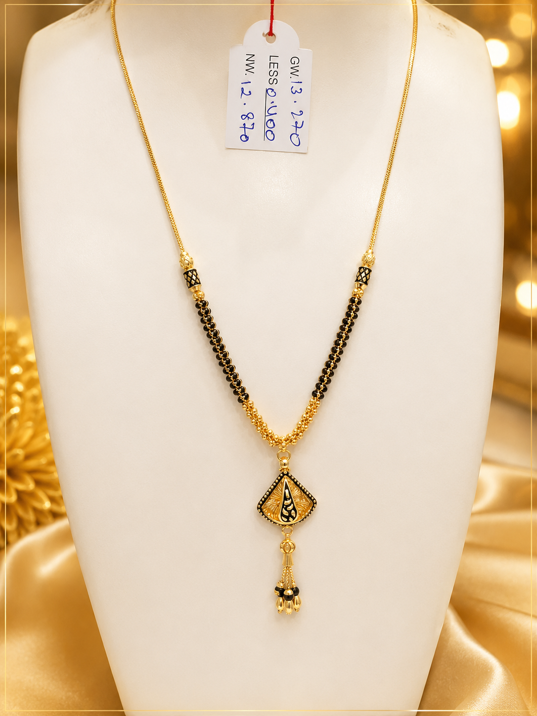 22K gold mangalsutra with black beads and fan-shaped meenakari pendant, 12.870 grams