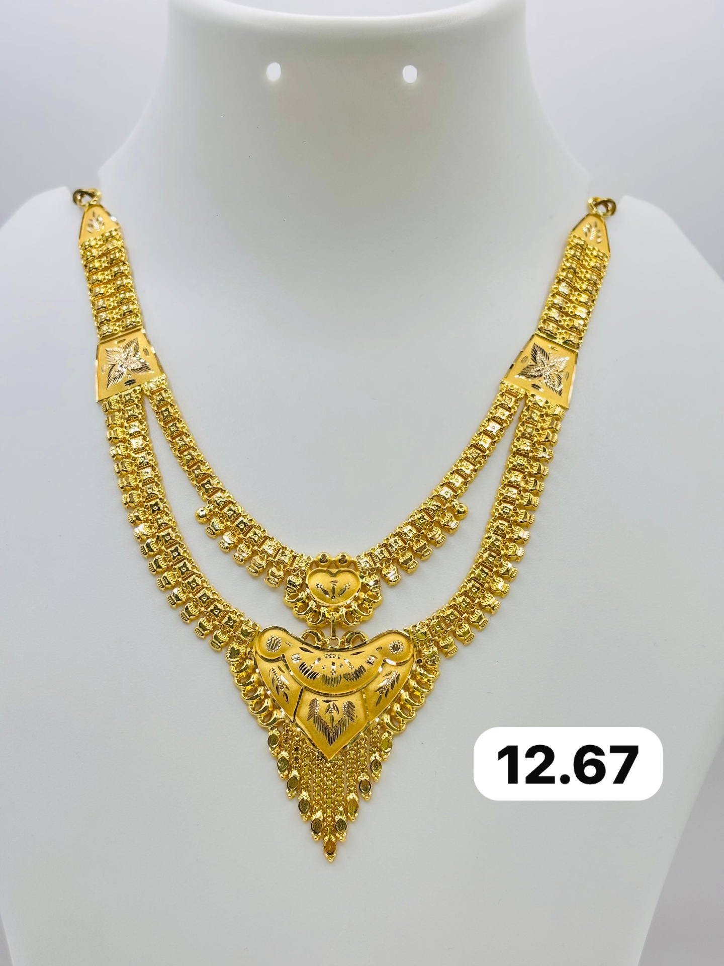 22K gold two-layer bridal necklace with heart-shaped centerpiece and tassel drops, 12.67 grams